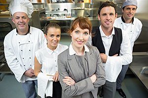 Female manager posing with the staff