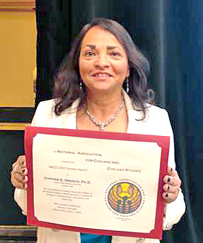 Photo of Dr. Orozco with award