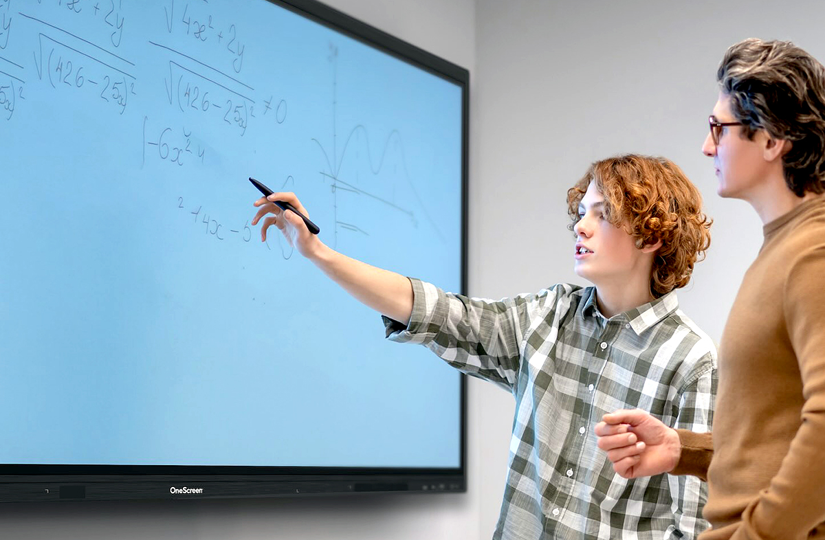 Photo of OneScreen Smart Board with student and teacher
