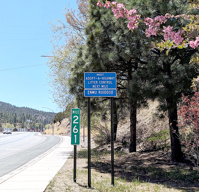 Photo of "Adopt-a-Hwy" sign for ENMU-Ruidoso