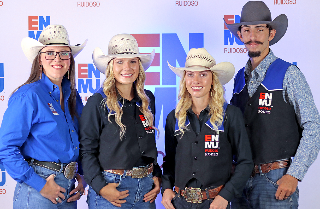 Photo of Coach Chelsea DeMott with Rodeo Team Members, fall 2025